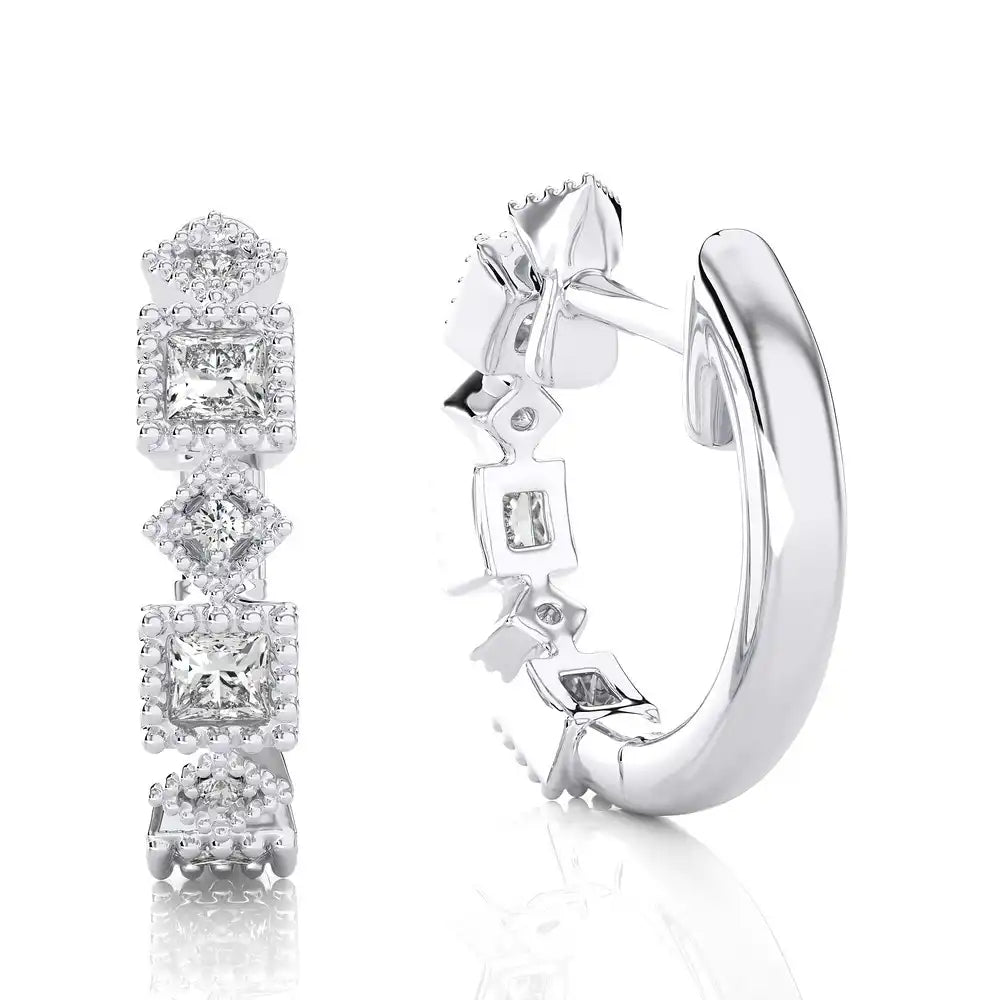 1/15 CTW Diamond Effortlessly Stylish Huggie Earring