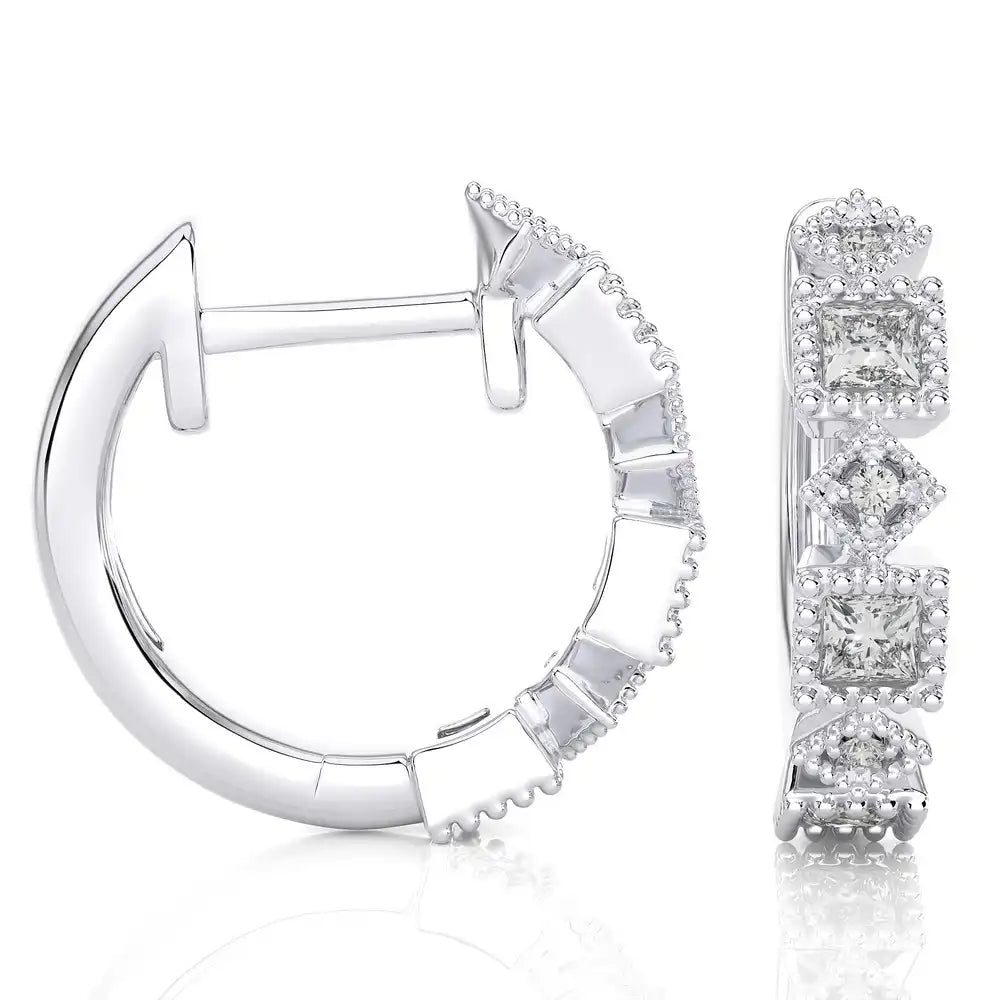 1/15 CTW Diamond Effortlessly Stylish Huggie Earring
