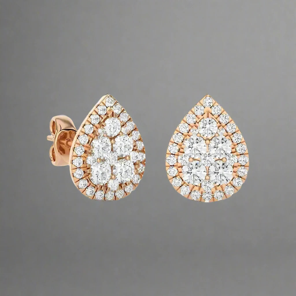 1- 1/3 CTW Excellent Round cut Diamonds set in Pear Shape Fashion Stud Earrings.