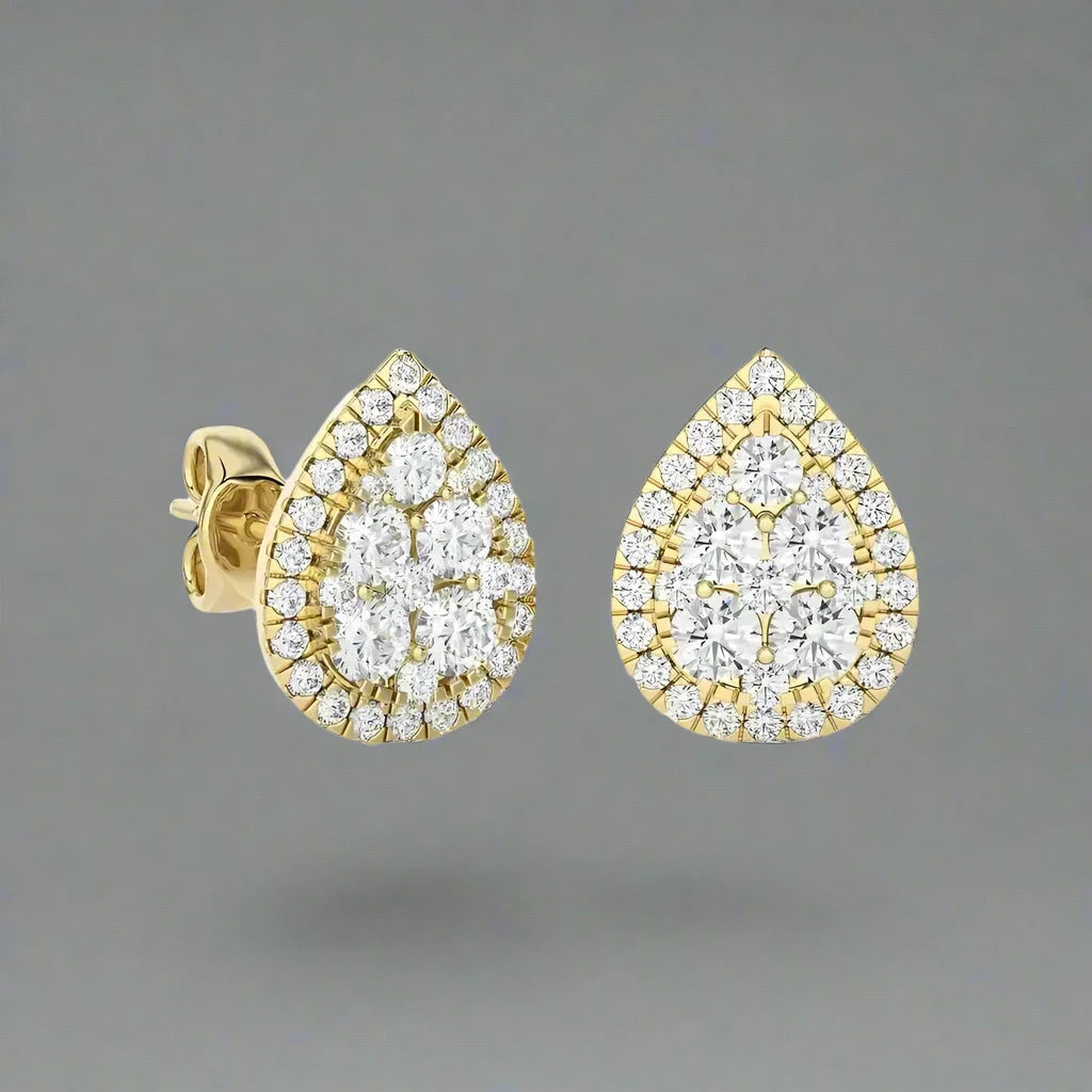 1- 1/3 CTW Excellent Round cut Diamonds set in Pear Shape Fashion Stud Earrings.