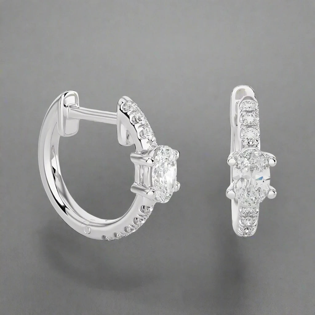 1/8 CTW Oval Diamond Delicate Fancy Huggie Earrings