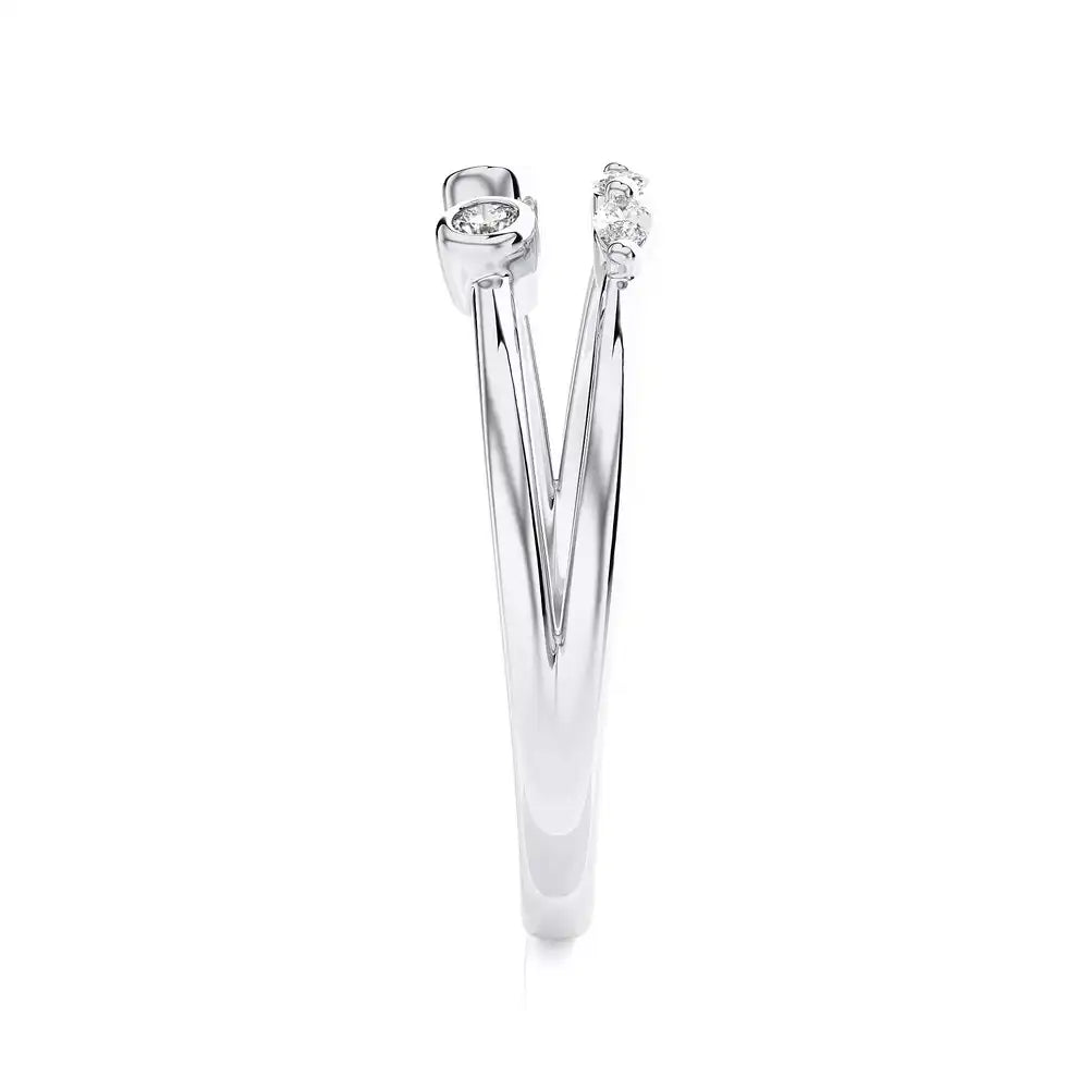 1/8 CTW Round & Marquese Diamonds set in Delicate Fashion Ring.